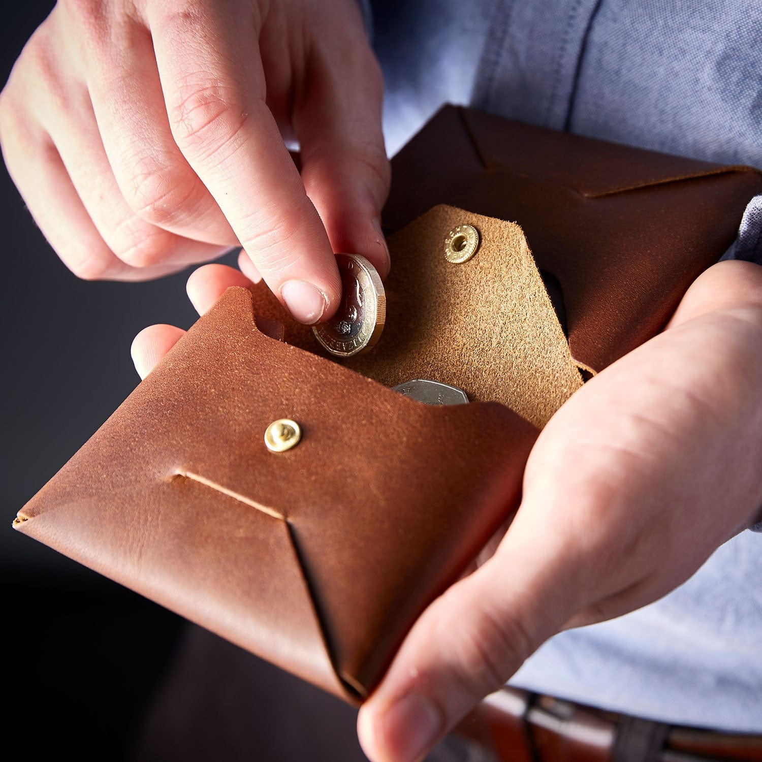 Bottega Veneta® Men's Intrecciato Folded Coin Purse in Black / Redstone. Shop online now.