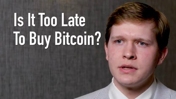 Video: Bitcoin Sign Guy Tells All About Infamous Janet Yellen Photobomb - CoinDesk