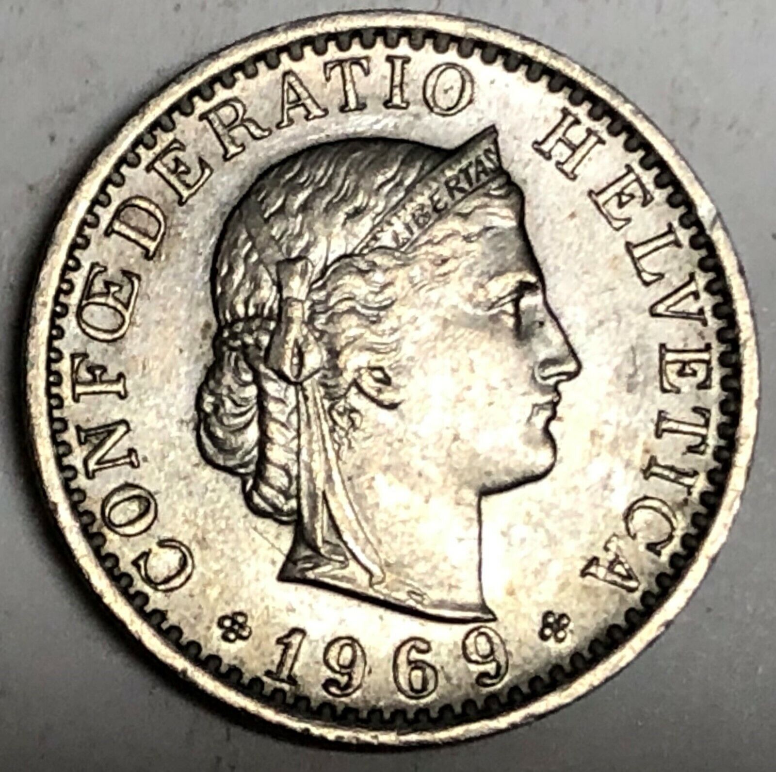 What is the worth of Confoederatio Helvetica 20 coin? - Answers