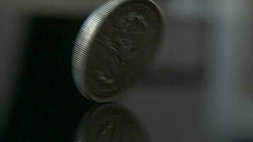 Coin Flip in Slow Motion, with Alpha | Stock Video | Pond5